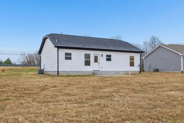 a house with yard in front of it