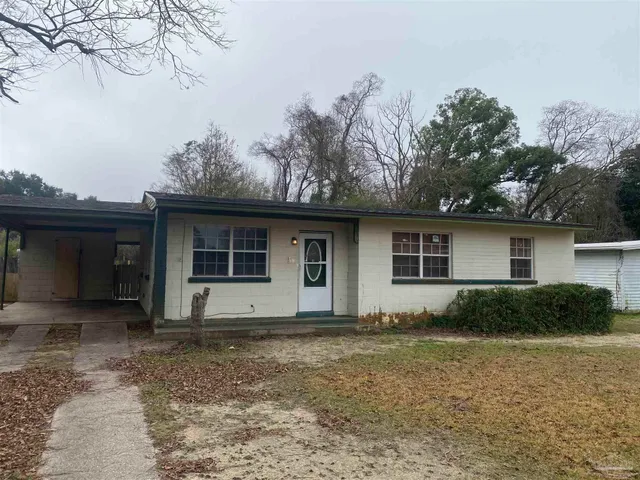 a house view with a outdoor space