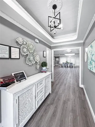 a kitchen with stainless steel appliances granite countertop a stove and cabinets