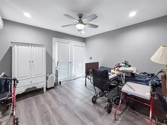 a workspace with furniture and wooden floor