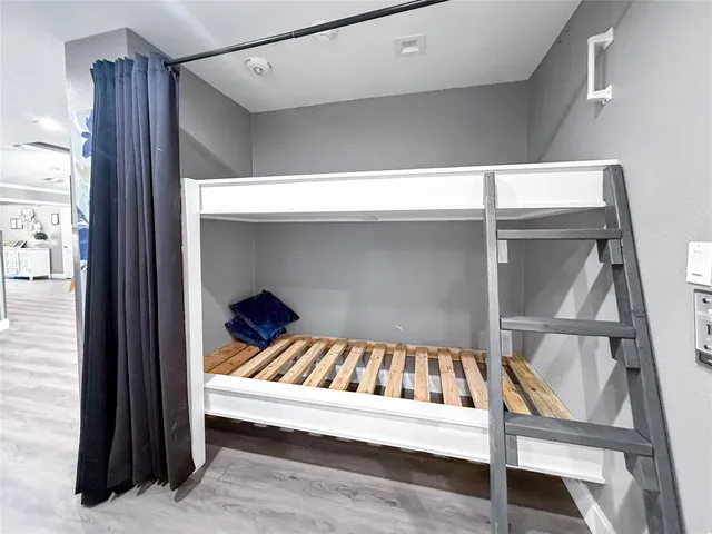 a view of storage and utility room with washer and dryer