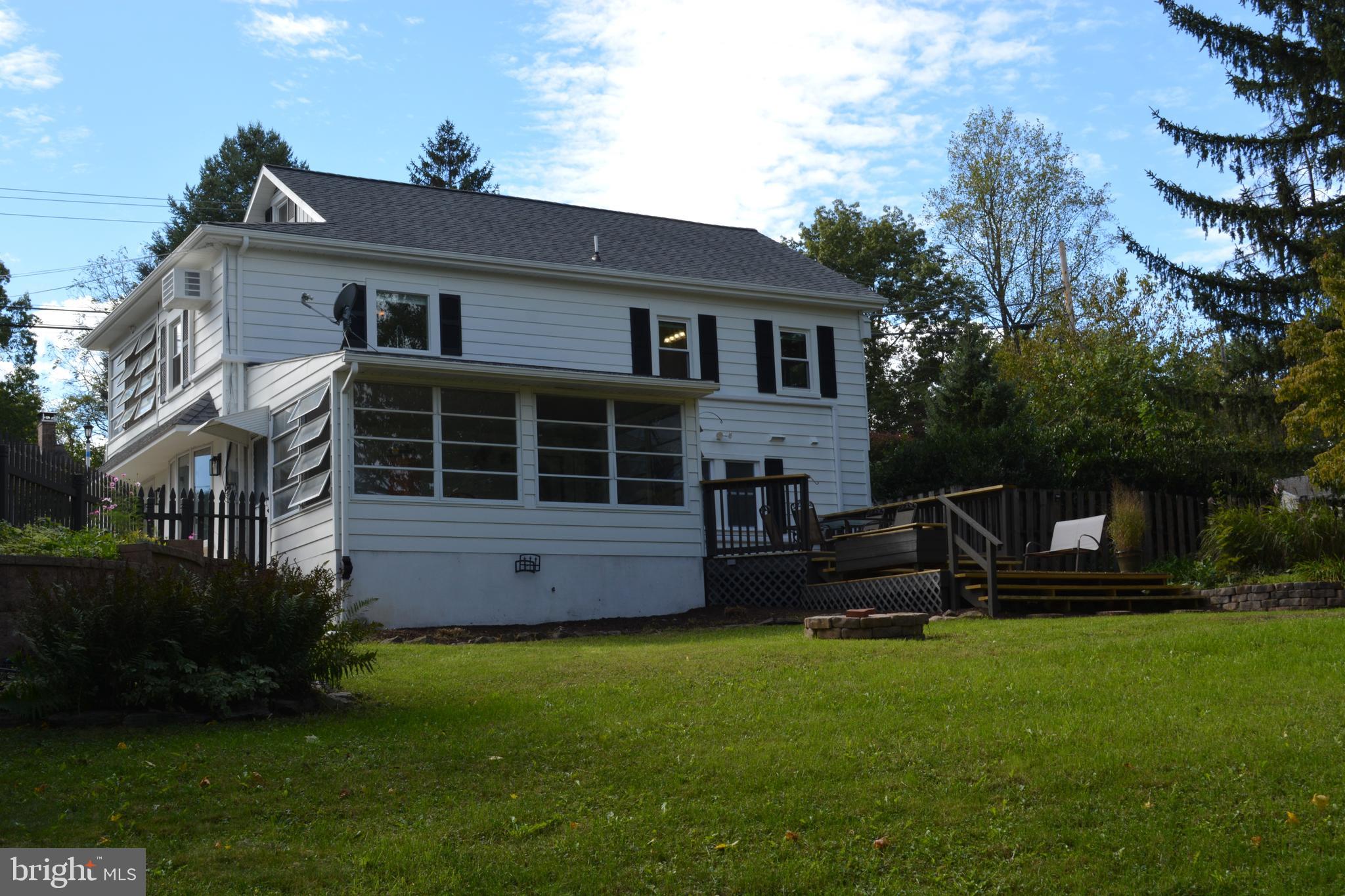 28 Hossler Road Manheim, PA 17545 - Photo 30 of 33 Sunroom and Deck