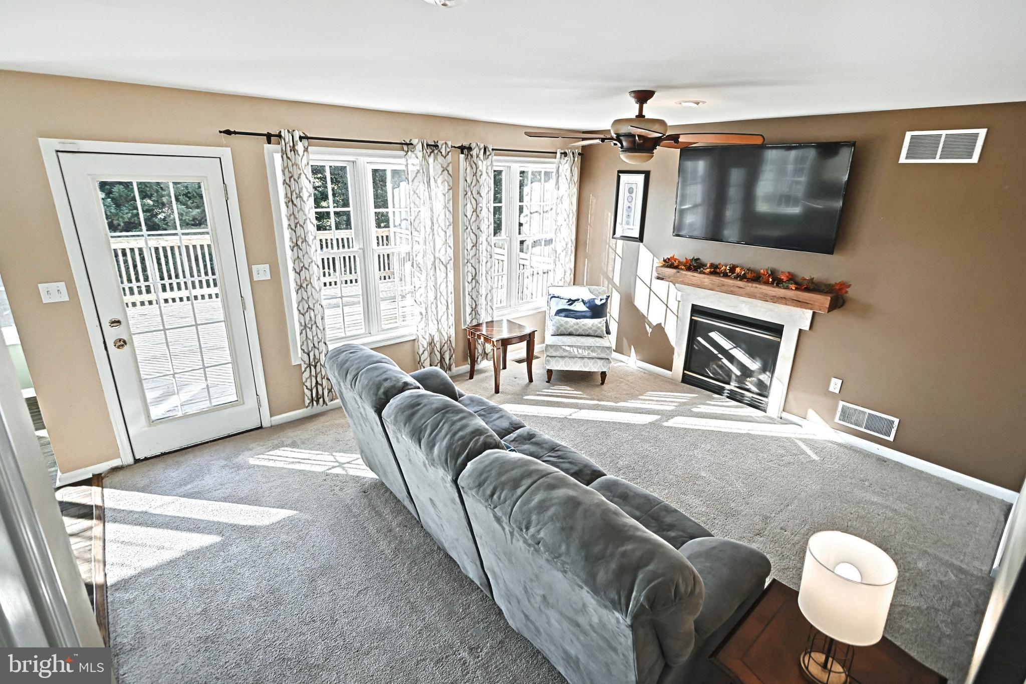 80 Oak Drive Mount Wolf, PA 17347 - Photo 10 of 51 Family room w/view to deck