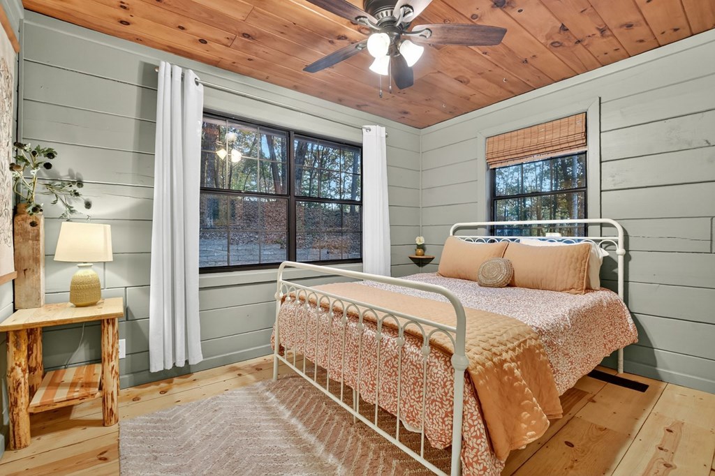 50 Lake View Drive Cherry Log, GA 30522 - Photo 18 of 27 a bed sitting in a bedroom next to a window