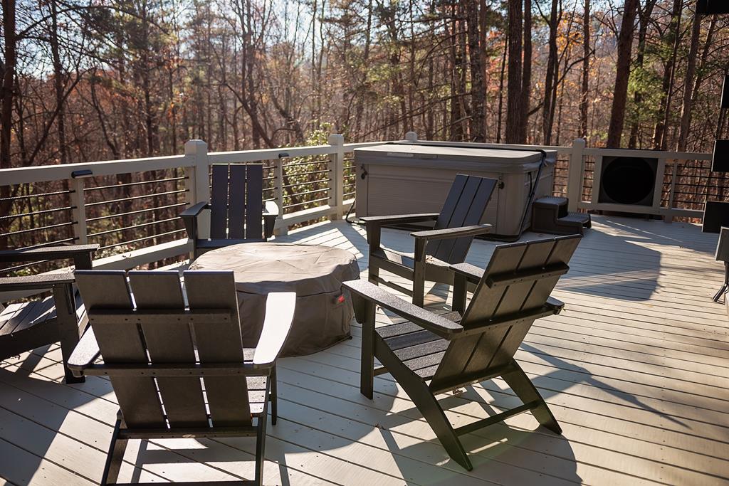 50 Lake View Drive Cherry Log, GA 30522 - Photo 24 of 27 a view of a chairs and table on the deck