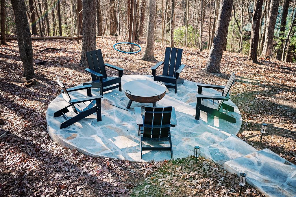 50 Lake View Drive Cherry Log, GA 30522 - Photo 27 of 27 a view of a house with backyard porch and sitting area