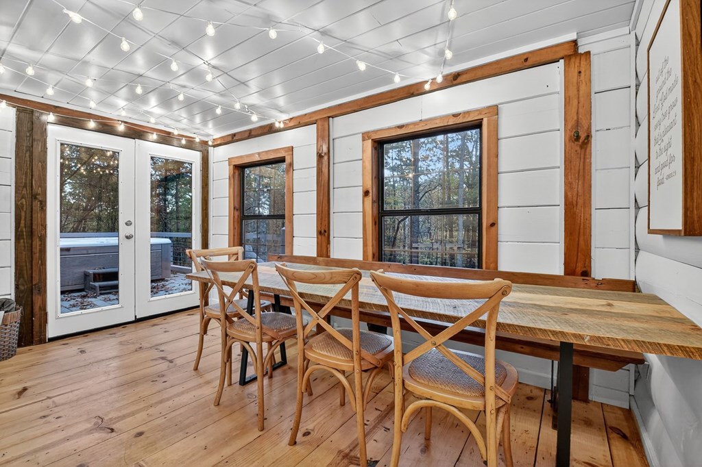 50 Lake View Drive Cherry Log, GA 30522 - Photo 10 of 27 a view of a dining room with furniture wooden floor and chandelier