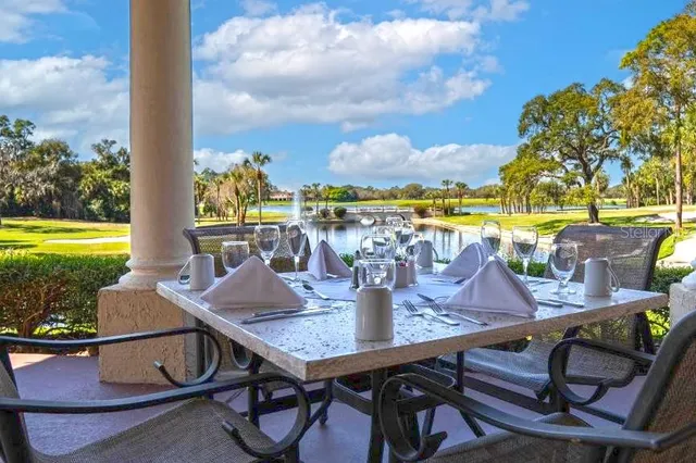 a view of an outdoor space with furniture