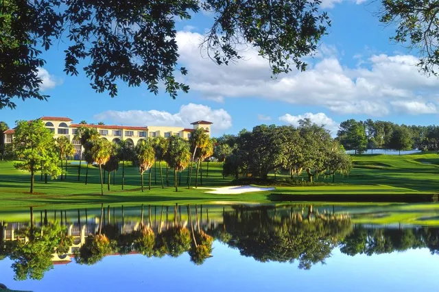 a view of a lake with a big yard