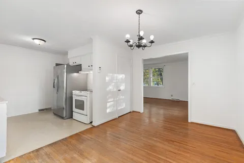 a view of a kitchen with a sink and dishwasher