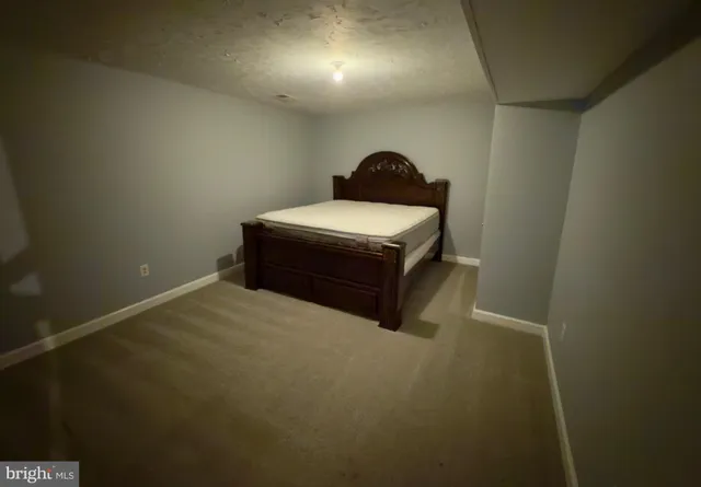 a room with a bed and a table