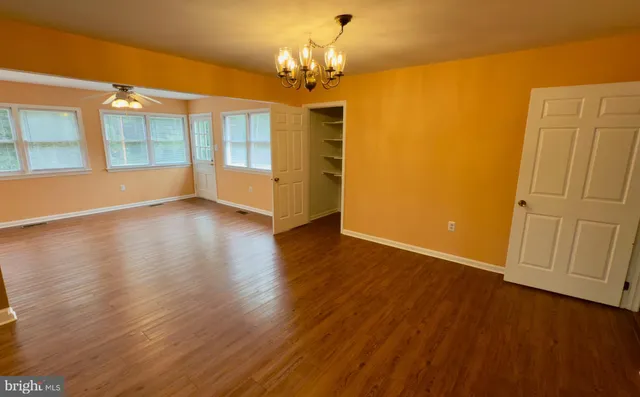 a view of livingroom with hardwood floor and window