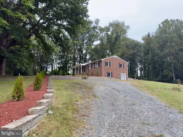 a house with trees in front of it
