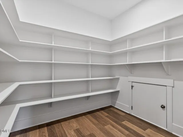a room with a book shelf