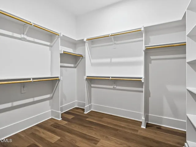a view of an empty walk in closet