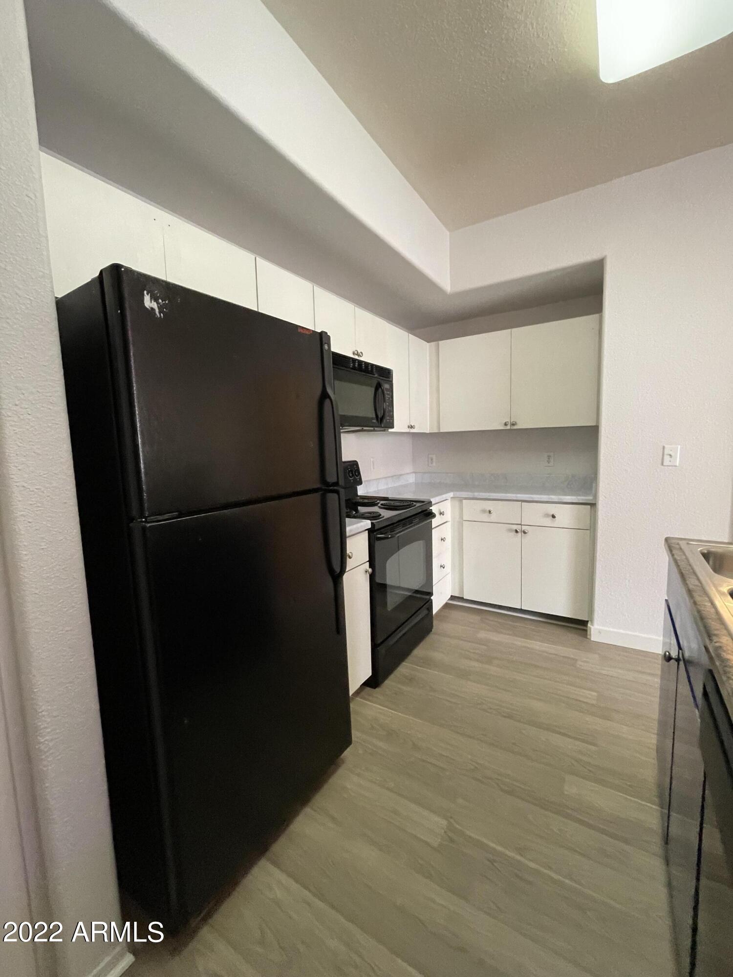18416 North Cave Creek Road, Unit 3022 Phoenix, AZ 85032 - Photo 3 of 8 18416 Kitchen