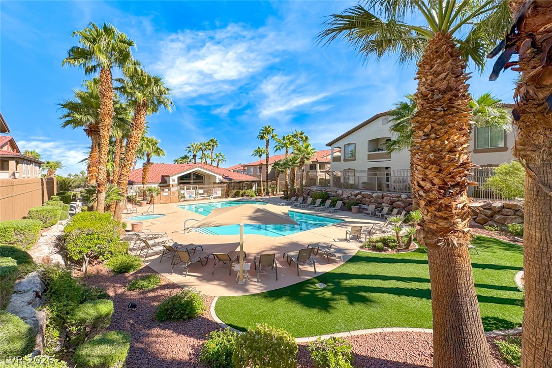 2305 West Horizon Ridge Parkway, Unit 3621 Henderson, NV 89052 - Photo 2 of 23 An oasis of leisure, this resort-style pool area offers abundant relaxation and recreation under swaying palms.
