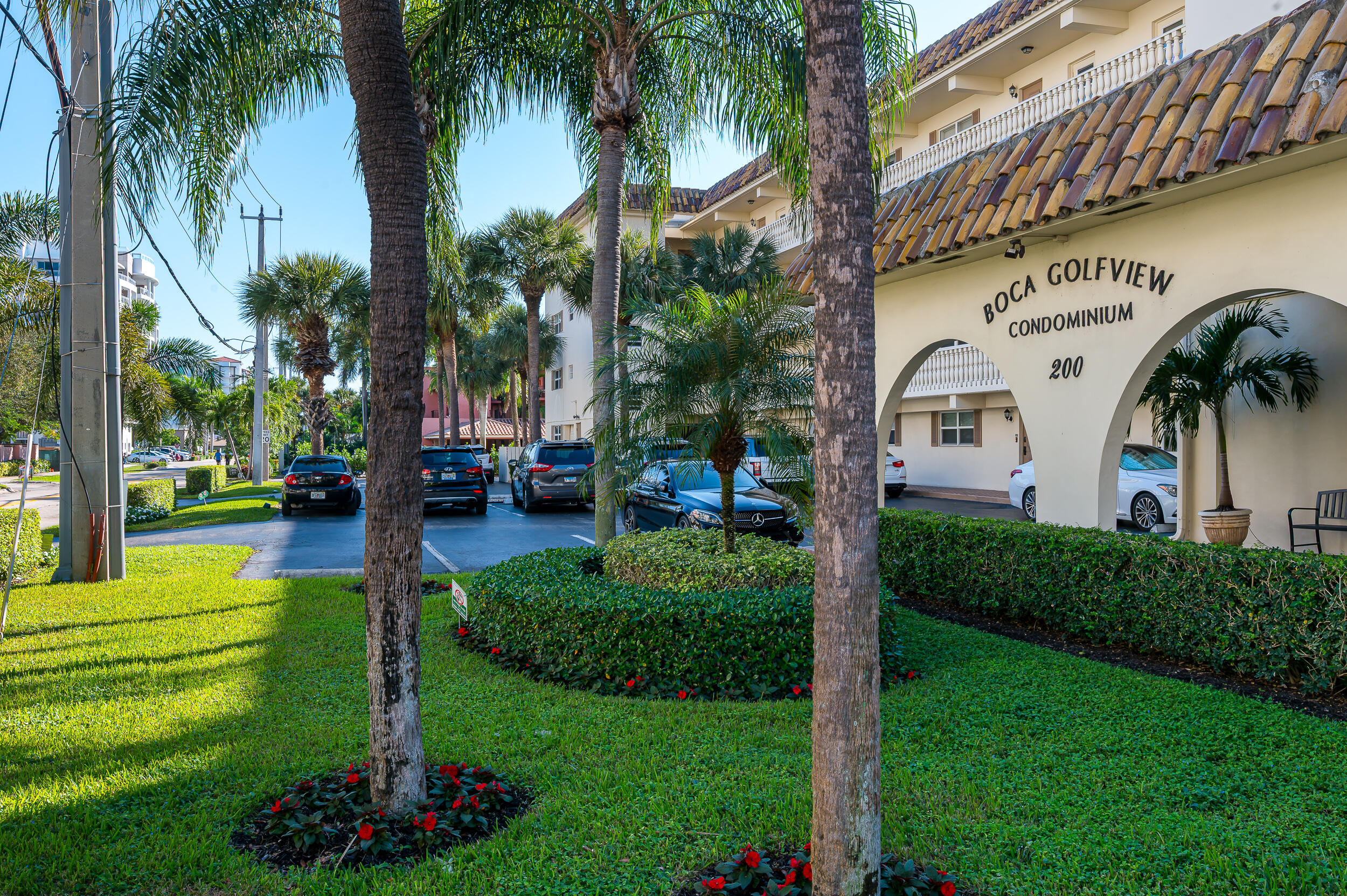200 East Royal Palm Road, Unit 4040 Boca Raton, FL 33432 - Photo 22 of 22 a front view of a building with garden
