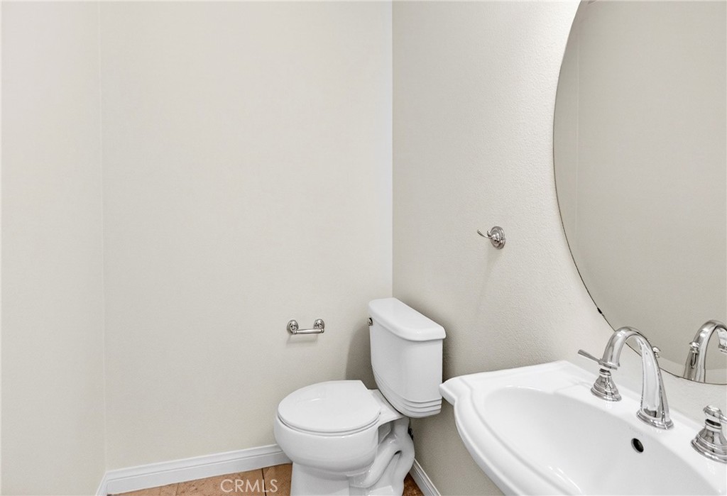 13740 Santa Maria Drive Rancho Cucamonga, CA 91739 - Photo 15 of 53 a bathroom with a sink and a toilet