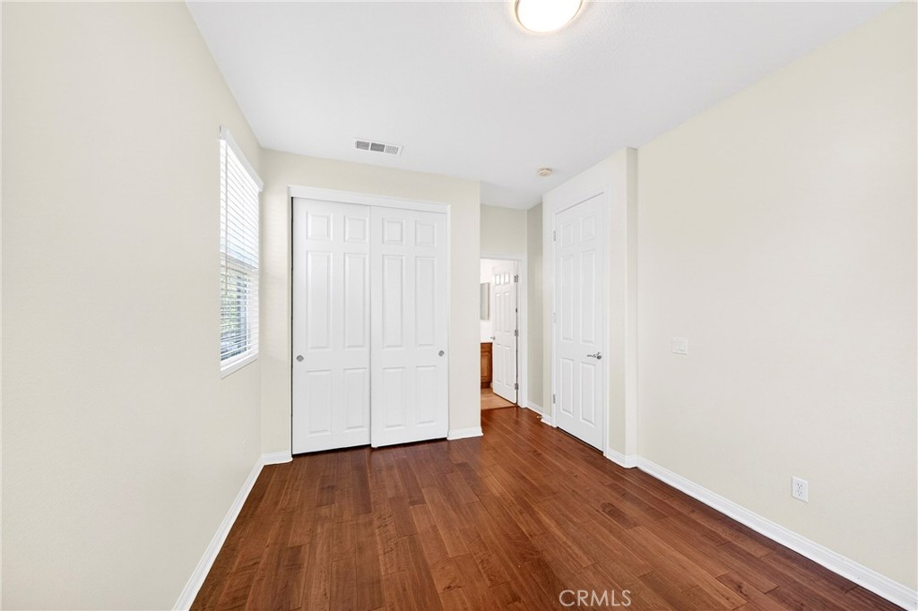 13740 Santa Maria Drive Rancho Cucamonga, CA 91739 - Photo 25 of 53 a view of a room with wooden floor