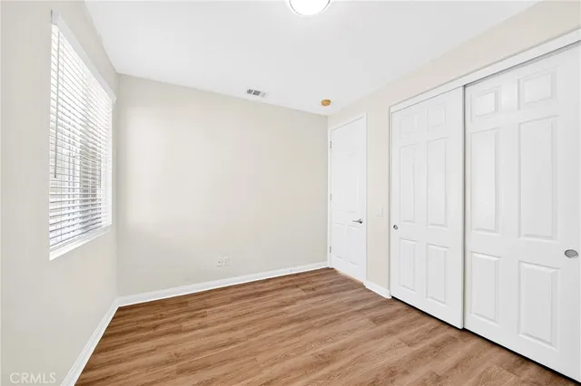 a bathroom with a toilet and a bathtub