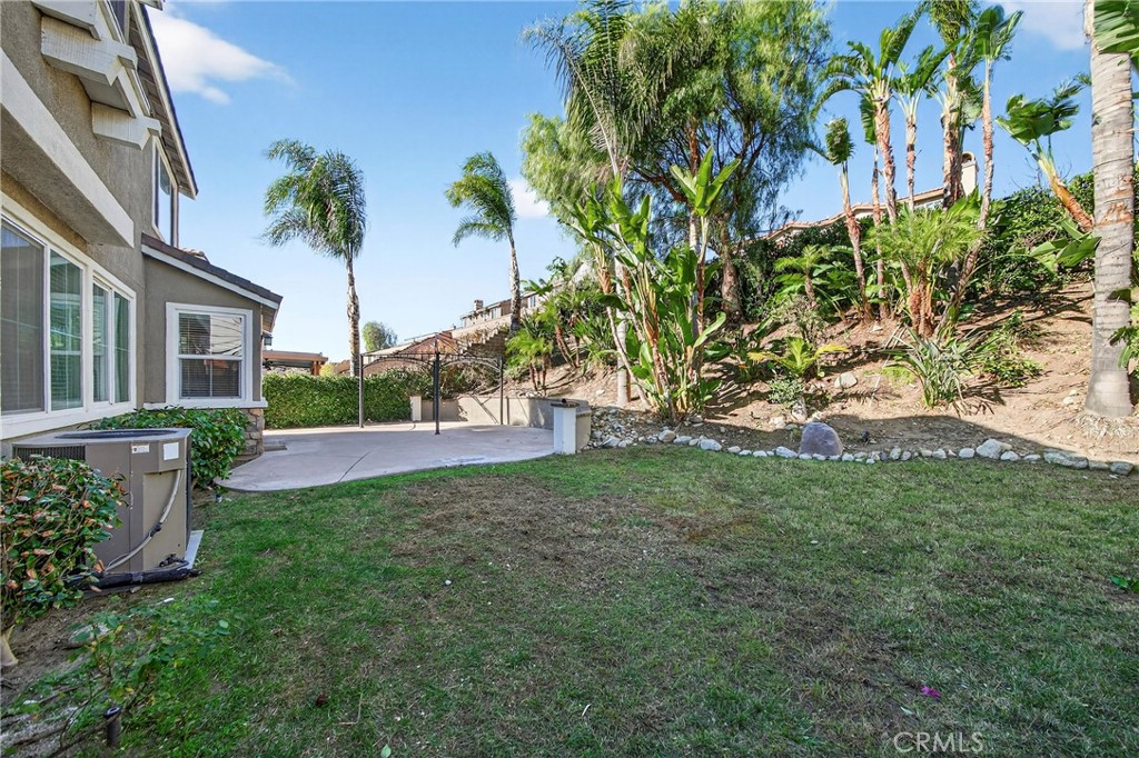 13740 Santa Maria Drive Rancho Cucamonga, CA 91739 - Photo 52 of 53 a view of a house with a yard and potted plants