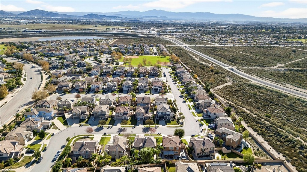 13740 Santa Maria Drive Rancho Cucamonga, CA 91739 - Photo 7 of 53 an aerial view of residential building and lake view