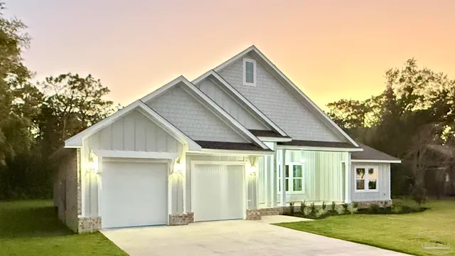 a view of empty room with wooden floor and fireplace