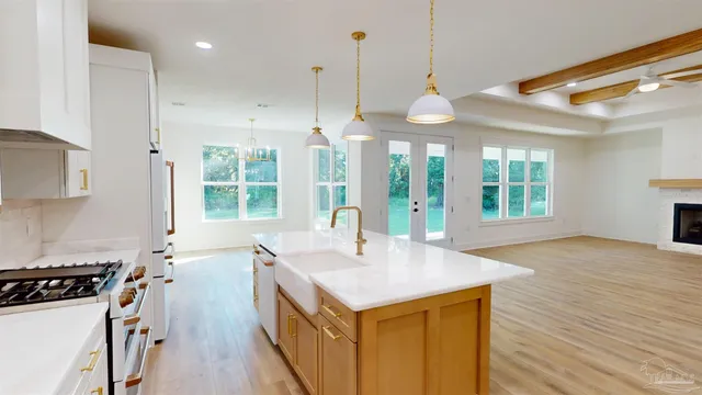 a view of a backyard with chairs
