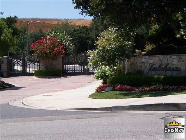 Beautifully landscaped entry gates to Calabasas Vi