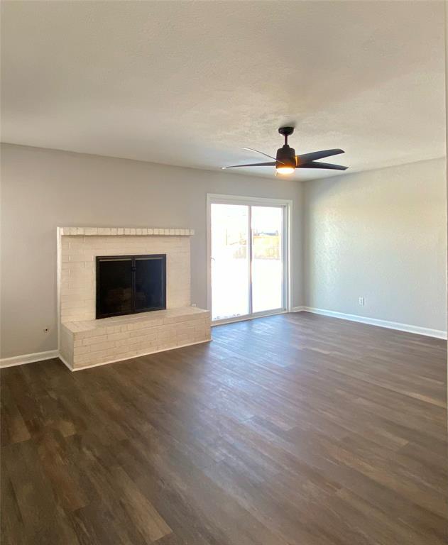 2004 Blue Bird Circle Bonham, TX 75418 - Photo 8 of 31 Den with fireplace and glass slider to patio