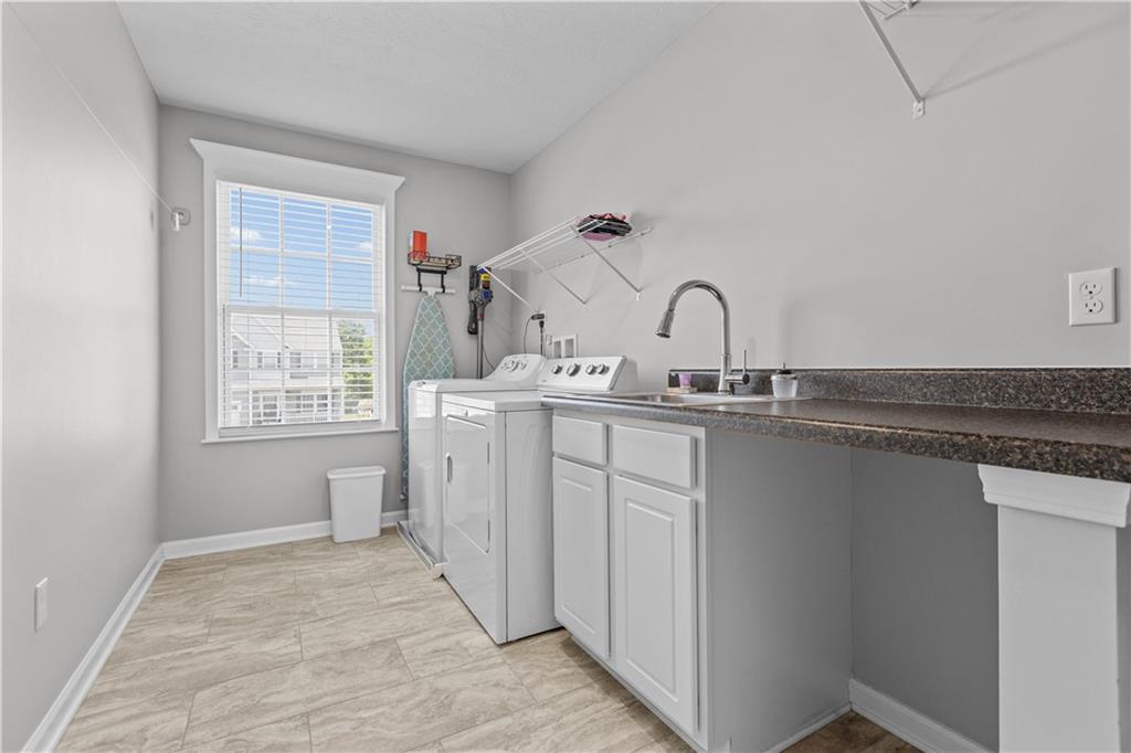 204 Ridgecrest Court Trafford, PA 15085 - Photo 26 of 35 Large laundry room with folding station