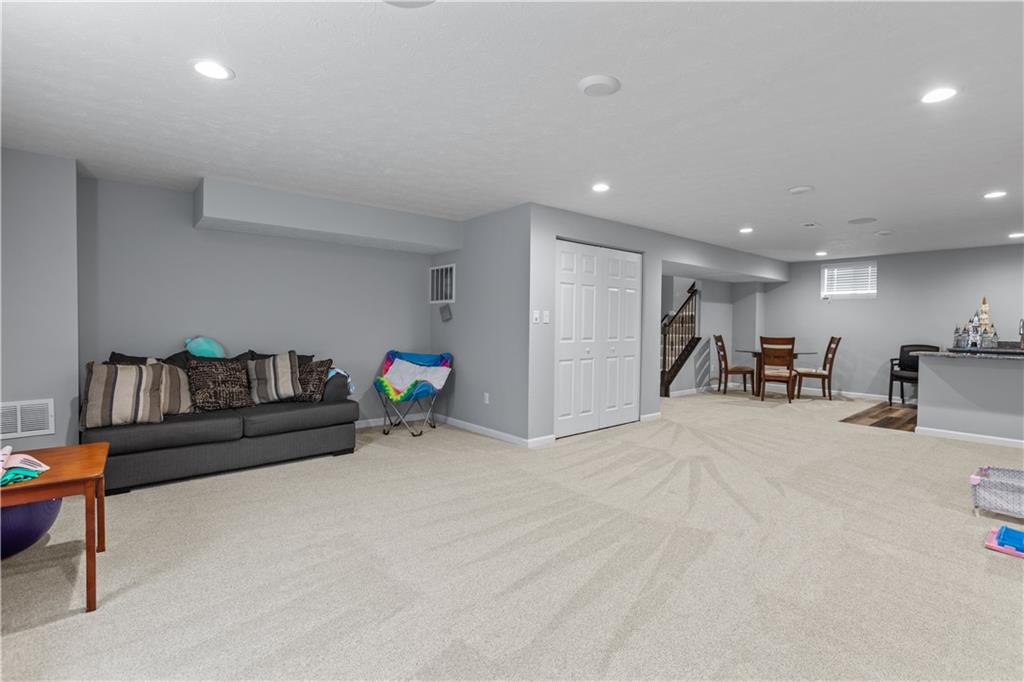 204 Ridgecrest Court Trafford, PA 15085 - Photo 29 of 35 Large finished basement perfect for entertaining. Recessed lighting and storage
