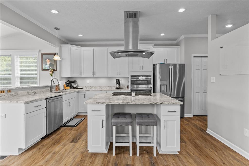 204 Ridgecrest Court Trafford, PA 15085 - Photo 9 of 35 Recessed lighting, updated paint, and quartz countertops!