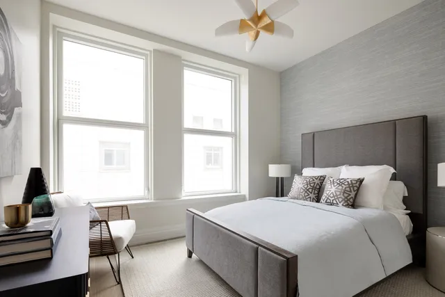 a bathroom with a sink a toilet and bathtub