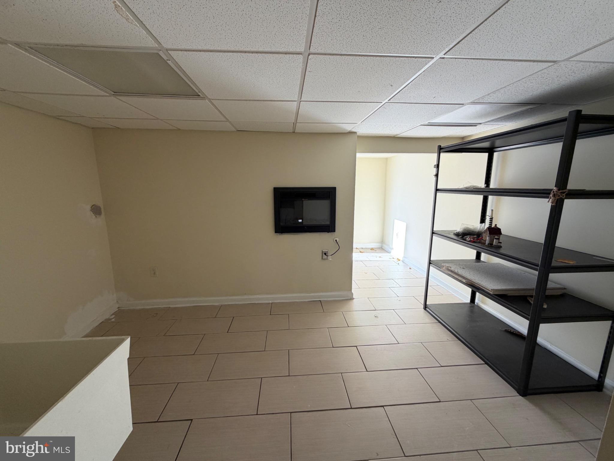 7 Rutherford Road Harrisburg, PA 17109 - Photo 18 of 20 Spacious room with modern tile flooring.