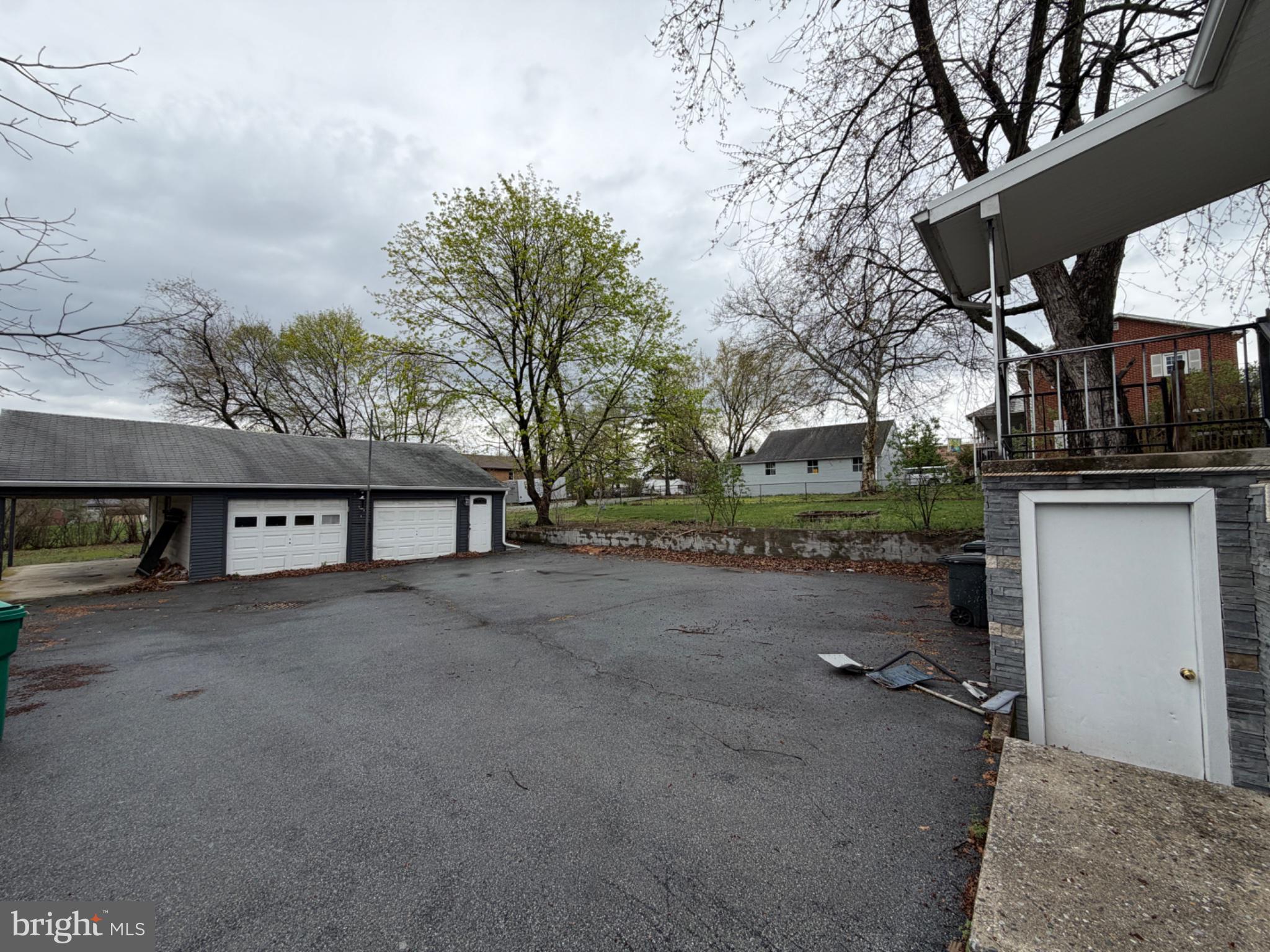 7 Rutherford Road Harrisburg, PA 17109 - Photo 2 of 20 Spacious outdoor area with greenery.