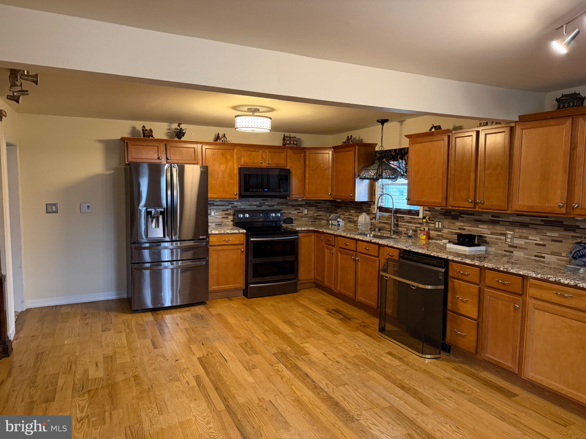 7 Rutherford Road Harrisburg, PA 17109 - Photo 6 of 20 Modern kitchen with warm wood tones.