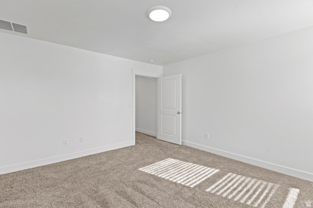 1262 West 500 South Logan, UT 84321 - Photo 28 of 39 Neutral-toned wall-to-wall carpeting complements the bright white walls and trim