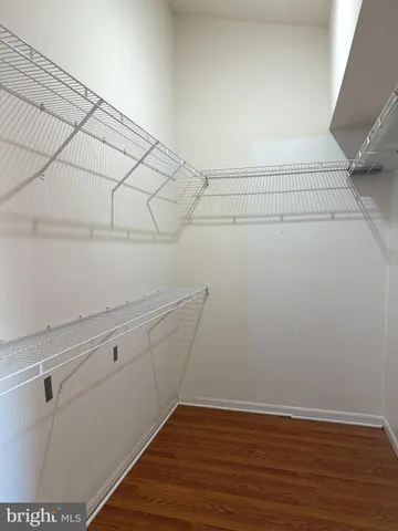 a view of a room with racks on the wall