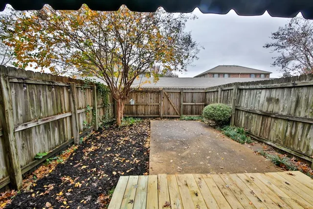 a kitchen with a sink and a stove top oven