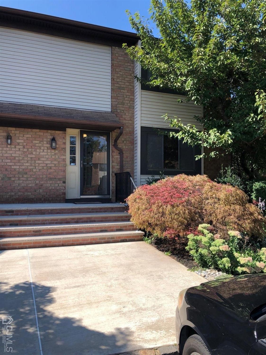 a view of a backyard of the house