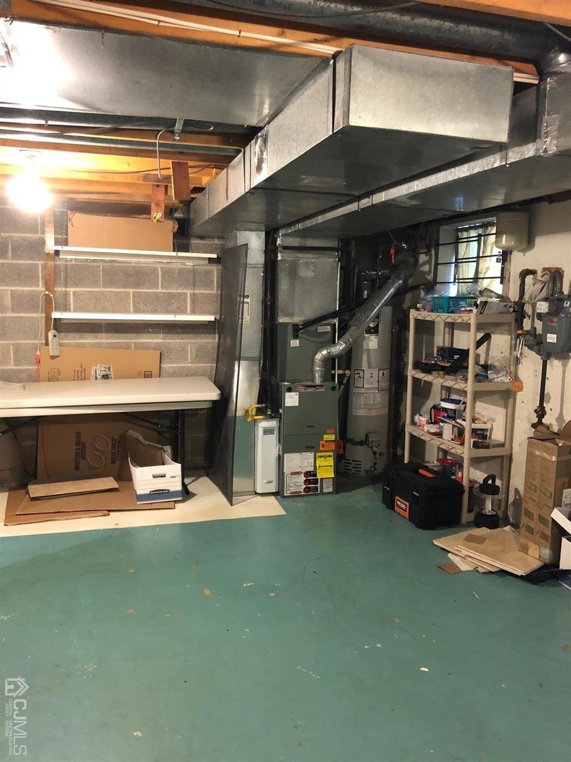 880 Robin Road Hillsborough, NJ 08844 - Photo 22 of 37 a view of a room with gym equipment