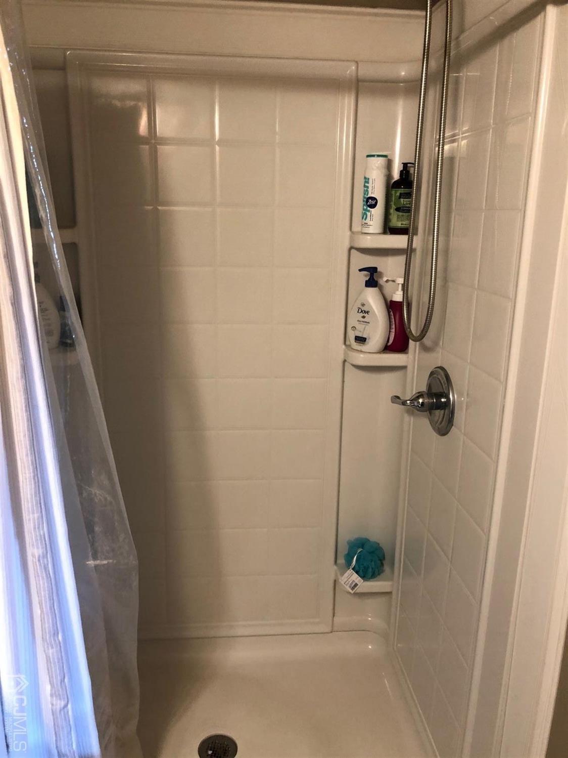 880 Robin Road Hillsborough, NJ 08844 - Photo 28 of 37 a bathroom with a shower
