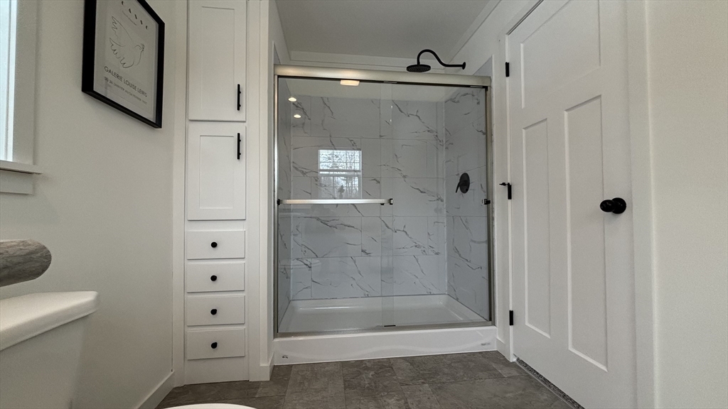 6 Berry Farms Road, Unit 6 Sturbridge, MA 01566 - Photo 13 of 16 a bathroom with a shower