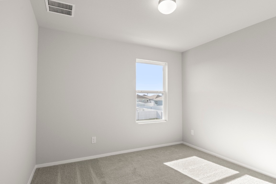 230 Barley Lane Elgin, TX 78621 - Photo 32 of 39 an empty room with windows