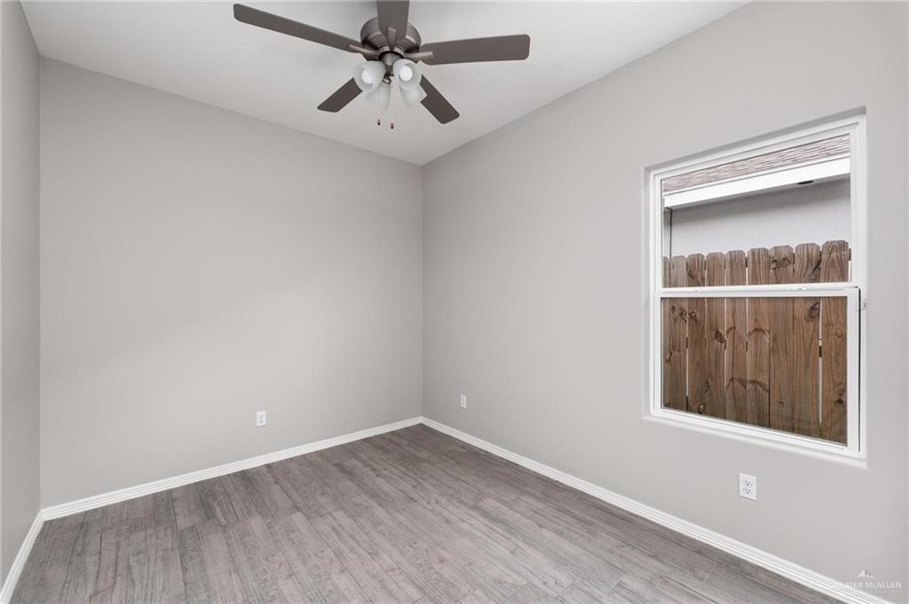 1804 Stauffer Street Weslaco, TX 78596 - Photo 13 of 23 an empty room with a window