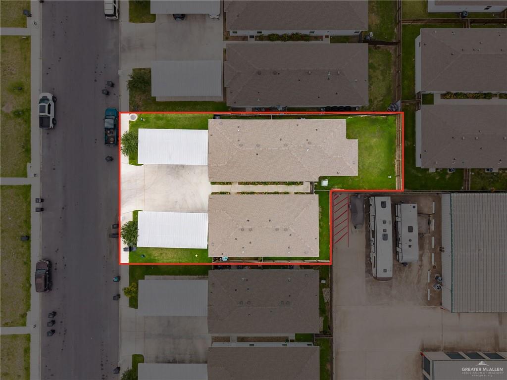 1804 Stauffer Street Weslaco, TX 78596 - Photo 14 of 17 an aerial view of residential houses with outdoor space