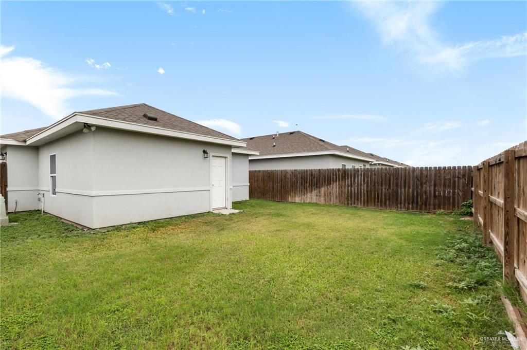 1804 Stauffer Street Weslaco, TX 78596 - Photo 15 of 17 a house view with a garden space
