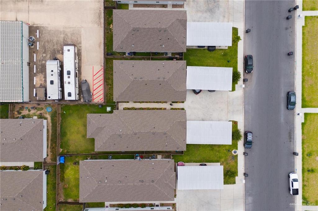 1804 Stauffer Street Weslaco, TX 78596 - Photo 19 of 23 an aerial view of houses with outdoor space